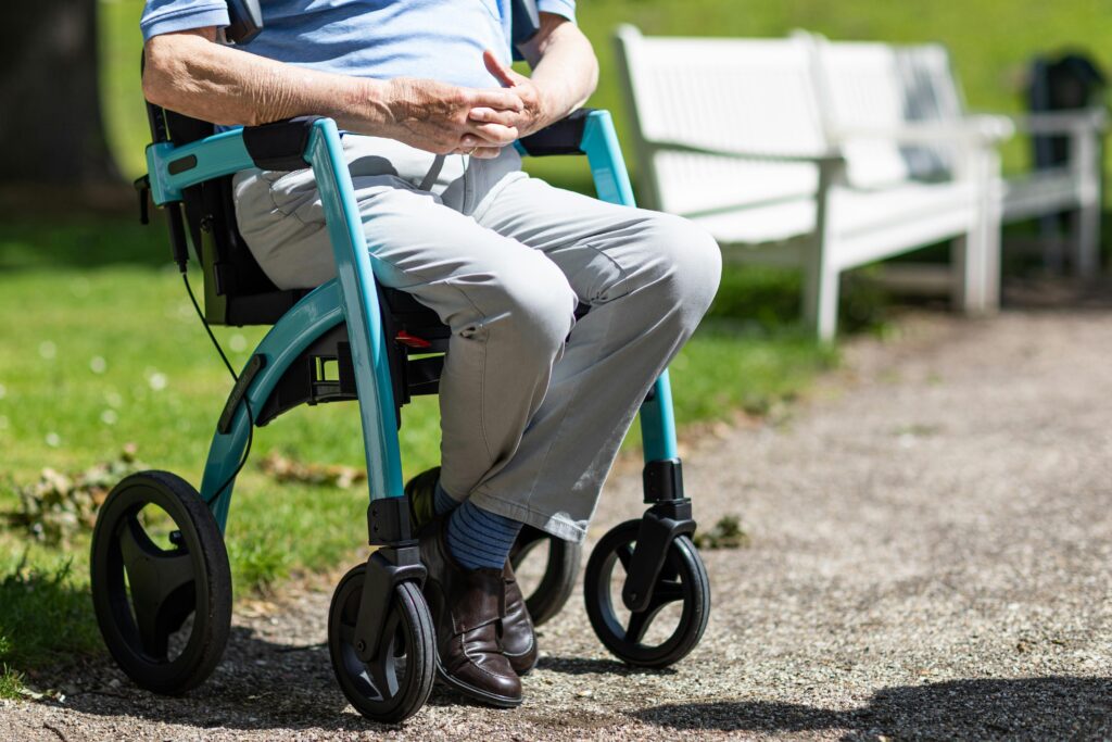 Old man sitting in a park